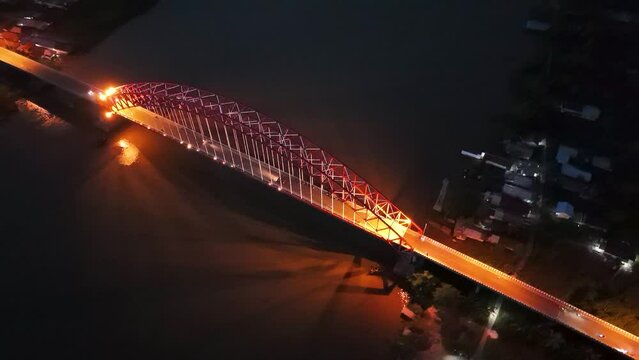 Rumpiang Bridge in the night, a bridge that stretches over the Barito river, Marabahan city, Barito Kuala district, South Kalimantan