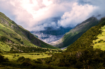 Landscape with mountains and clouds. Valley of Flowers, a beautiful Trek in the Himalayas, Nanda...
