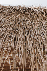 Closeup view of traditional roof made of dried straw thatch
