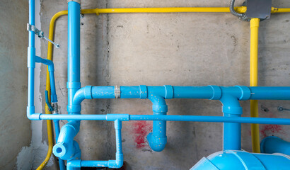 The water pipe system, wastewater pipes and electrical wiring are neatly installed under the...