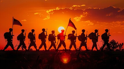 Captivating silhouettes of soldiers in synchronized march against the colorful sunset sky.