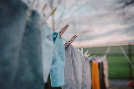 Clothes drying on string at back yard