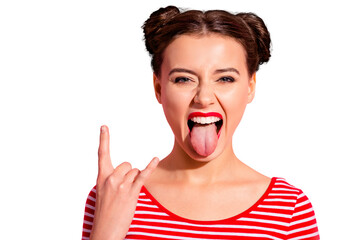 Close up photo beautiful carefree she her lady pretty hairdo two buns bright red pomade big lips tongue out mouth rocker gesture wear casual striped red white t-shirt isolated pink background
