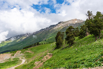 Beautiful panoramic view of the mountains. Aerial beautiful summer landscape of Caucasus mountain.