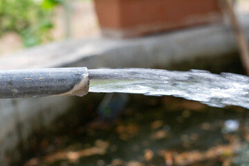 The water pipe that fills the irrigation pond