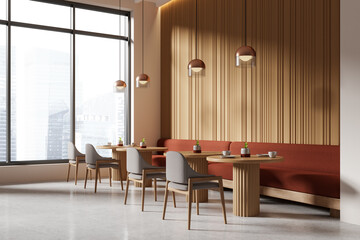 An interior of a modern cafe with wooden furniture, large windows, and a city view, conveying a warm, inviting atmosphere. 3D Rendering