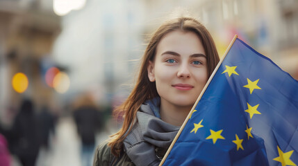 Woman holds the European Union flag in her hand. EU flag at a demonstration for EU accession