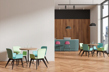 A modern cafe interior with colorful chairs, wooden tables, panoramic windows, and striped wall panels, light. 3D Rendering