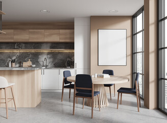 Modern kitchen interior with a dining area and a blank mockup poster on the wall, wooden and marble...