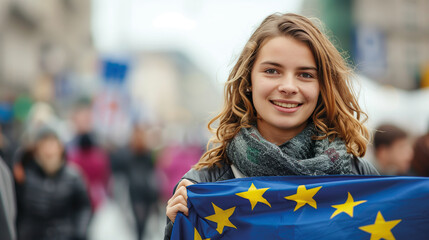 Woman holds the European Union flag in her hand. EU flag at a demonstration for EU accession