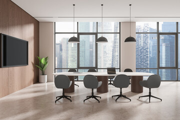 A modern office interior with a conference table, chairs, a plant, and a TV against a backdrop of large windows with a city view, 3D Rendering.
