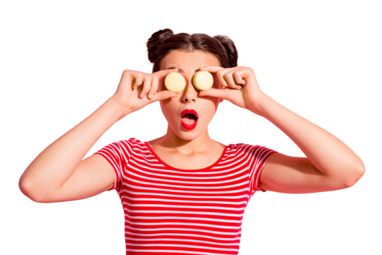 Close-up portrait of nice cute charming attractive glamorous lovely funny comic teen girl in striped t-shirt covering eyes with colorful delicious snack opened mouth isolated over pink background - Powered by Adobe