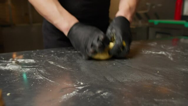 Hand Making The Tradition Dough Of Homemade Pasta At Metallic Table