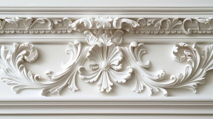 Ornate white plaster relief on wall. Classical architecture detail.