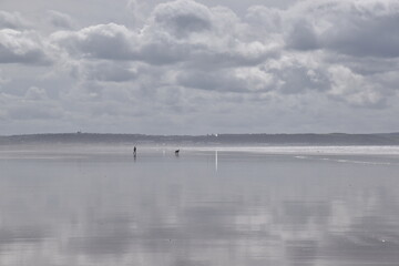 Obraz na płótnie Canvas the reflections on saunton sands as far as you can sea
