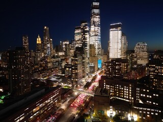 Fototapeta premium New York City Manhattan at sunrise. New York at Night. NYC Night aerial view of New York. NYC New York skyline with WTC. Famous landmarks in NYC. Skyscrapers NYC skyline. Night traffic in big city.