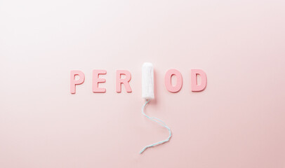 White sanitary pad and the text on pastel background. Woman health or body positive concept. © Siam