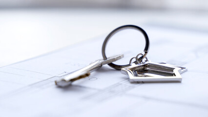 keys to a new apartment on an apartment purchase and sale agreement