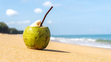 Coconut cocktail on the sandy beach