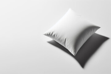 White pillow on a clean background. Space for text.