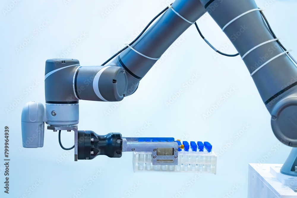 Wall mural robot arm with test tube for biological experiments in laboratory