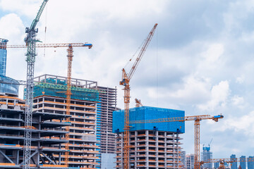 Construction of high-rise buildings in City, industrial construction site
