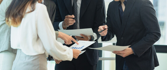 Co-workers working teamwork together concept. Asia young creative people stand together at startup.