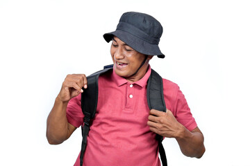 Pose of an Asian man wearing a jungle hat and backpack