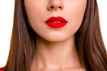 Close up half face crop portrait of brunette woman with red lips slightly opened her mouth isolated...