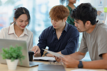 Group of Asian young business creative people meeting together share data in creative office workplace, Investment business and start up project concept.