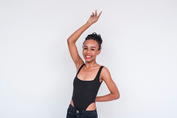 Young woman of mixed African and Asian ancestry poses in black bodysuit