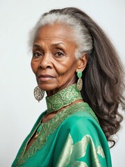 elderly african beautiful woman on green dress with long hair on plain white background close-up portrait from Generative AI