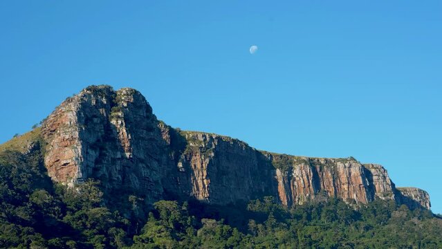 4k Footage of cliff near the Mzimvubu River in Port Saint Johns, South Africa. Daylight with the moon over the mountains during the day.