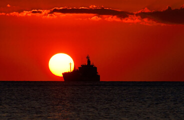 Tombeau Bay, Baie-du-Tombeau, Pamplemousses District, Mauritius, Mascarene Islands, Africa - sunset...