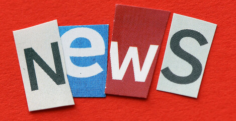 NEWS a word composed of letters cut out of a newspaper.