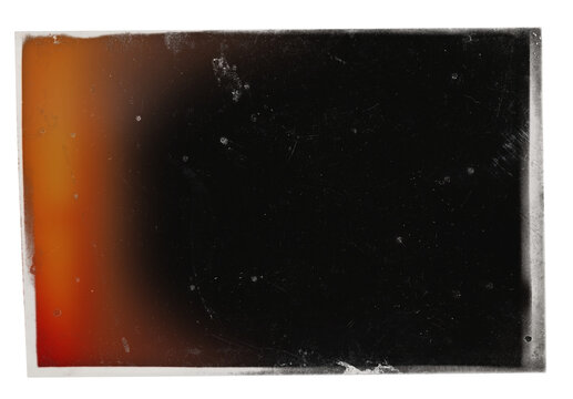 Vintage photo, black background with red light leak, dusts and scratches, with semi-transparent egde of the film on transparent background. Retro photo film background for artistic templates.