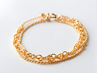 Obraz premium A pair of gold bracelets, gold jewelry, on a solid color background, with concepts of love and marriage, Valentine's Day