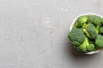 broccoli of fresh green broccoli in bowl over coloredbackground. , close up. Fresh vegetable