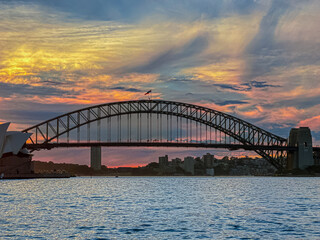 Obraz premium Monday 29 April 2024 Beautiful colours of the Sky at sunset over Sydney Harbour Bridge NSW Australia 