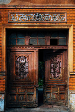 Old brown wooden door in Petrovaradin, Serbia