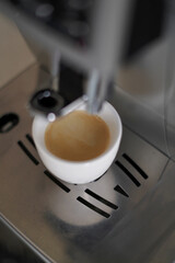 Cup of Espresso with Crema Foam Just Made in Coffee Machine. Cafe. Bar.