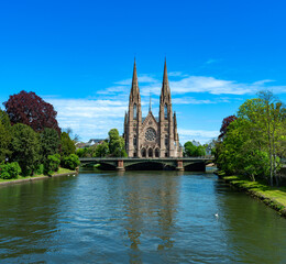 Fototapeta na wymiar Cityscape of Strasbourg and the Reformed Church Saint Paul. France, Europe.