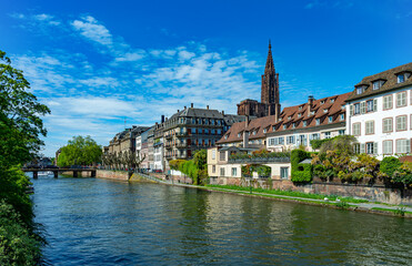 Fototapeta na wymiar Strasbourg. Old town. waterside promenade of the Ill with the cathedral. France, Europe