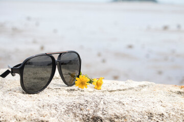 yellow flowers cosmos with sunglass of lifestyle woman relax summer arrangement flat lay postcard...