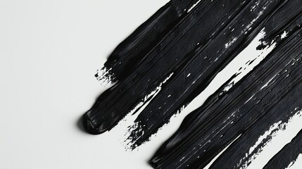 The allure of simplicity: minimalist black brush strokes add intrigue to a pure white background.