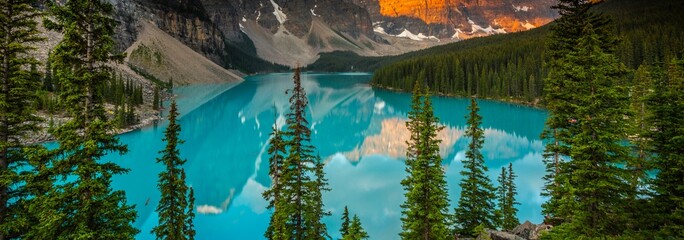 Golden Hour Magic: Sunset Over Ten Peaks at Moraine Lake, Banff National Park, Alberta, Canada -...