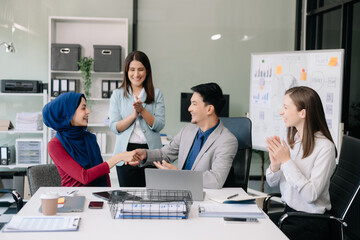 Business partnership handshake concept.Photo two coworkers handshaking process..