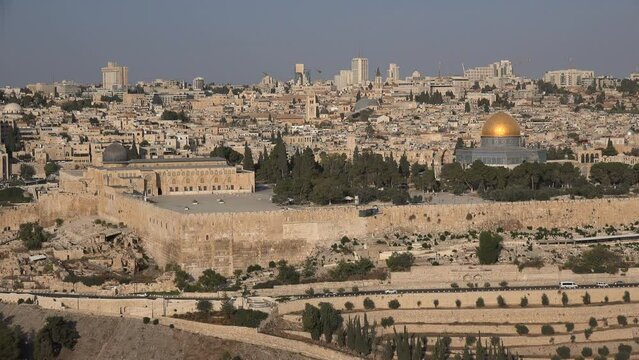 Various landmarks of Jerusalem caught in one shot, including the Dome of the Rock, the Al Aqsa mosque, and the Church of the Holy Sepulchre
