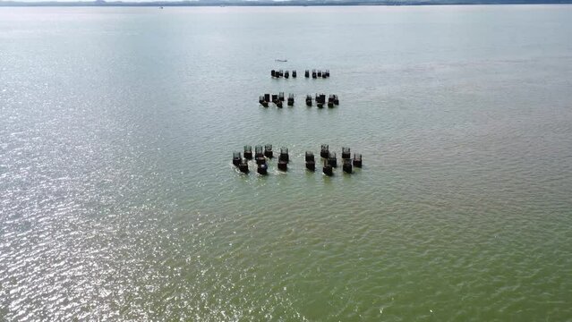 Aerial view of bridge foundations embedded in the seabed