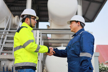 Portrait of professional man engineer working checking work place to keep liquid helium in industry.